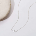 Silver Slant Cross Necklace with Asymmetrical Link Chain